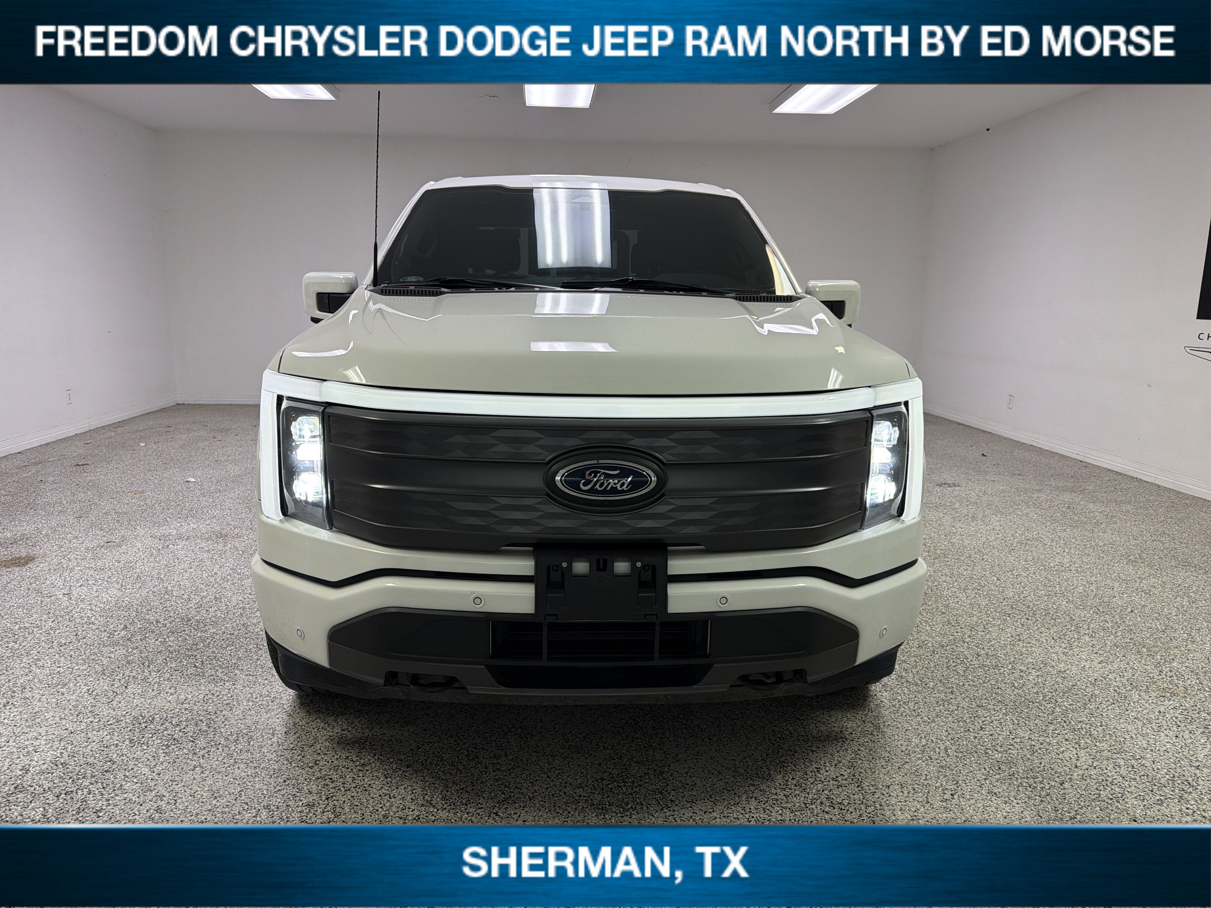 Used 2022 Ford F-150 Lightning Lariat with VIN 1FT6W1EV4NWG02164 for sale in Sherman, TX